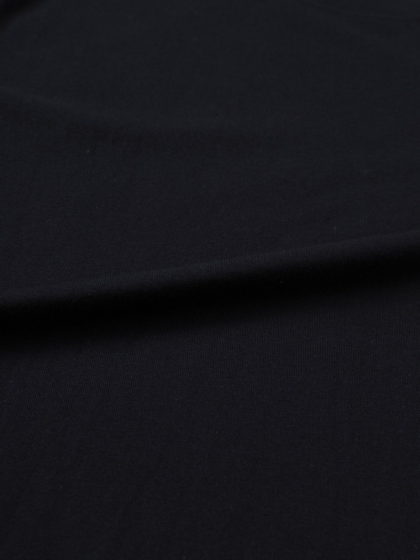 Unisex white cotton T-shirt featuring Drogba print from ODMPOD, casual wear with a comfortable fit and graphic design.