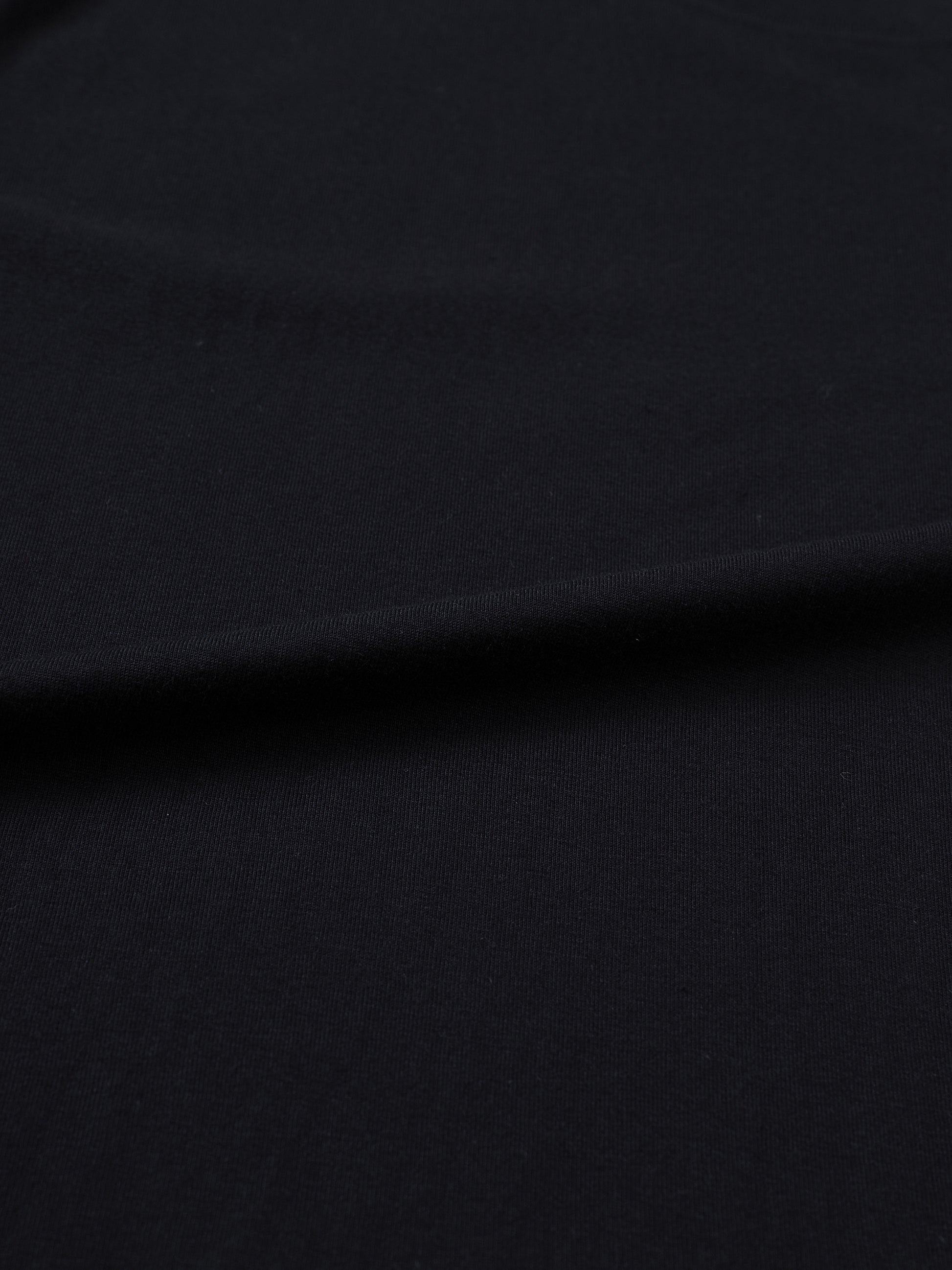 Unisex white cotton T-shirt featuring Drogba print from ODMPOD, casual wear with a comfortable fit and graphic design.