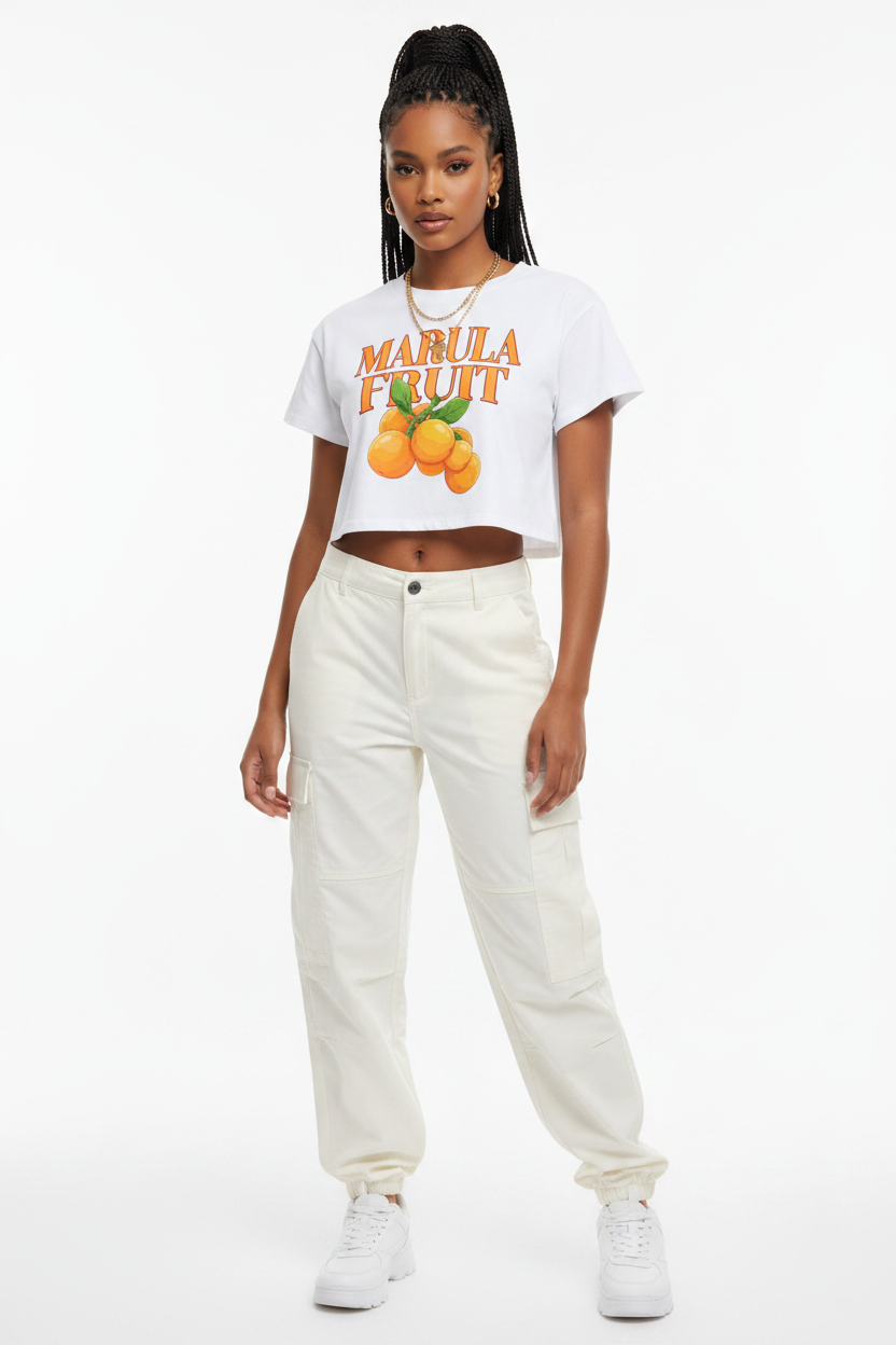 Model wearing white Marula Fruit Baby Tee, medium shot